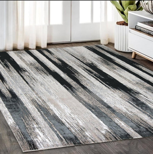 4' X 6' Black Silver and Gray Abstract Power Loom Area Rug